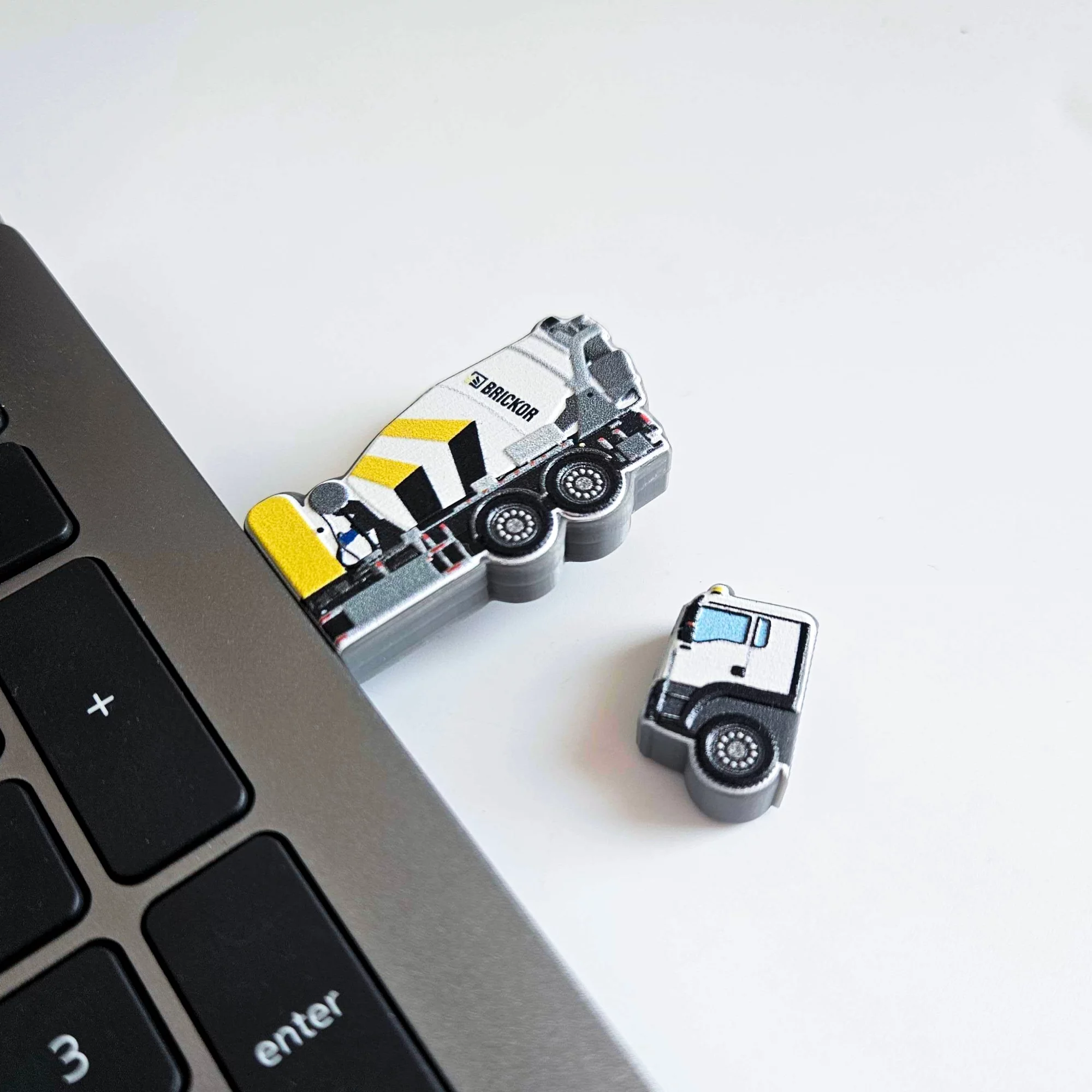 Corporate USB flash drive with a cap, concrete mixer shape, made of hard and lightweight resin, Polish manufacturer DECARD