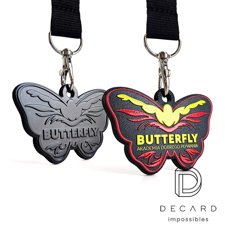 Swimming medals for children, butterfly-shaped, red, black, and yellow, hard resin, Polish manufacturer DECARD