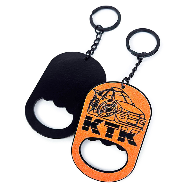 Metal keychain with a bottle-opener function, made for the Kadett Tuning Club meet-up, featuring raised 3D graphics, Polish manufacturer DECARD