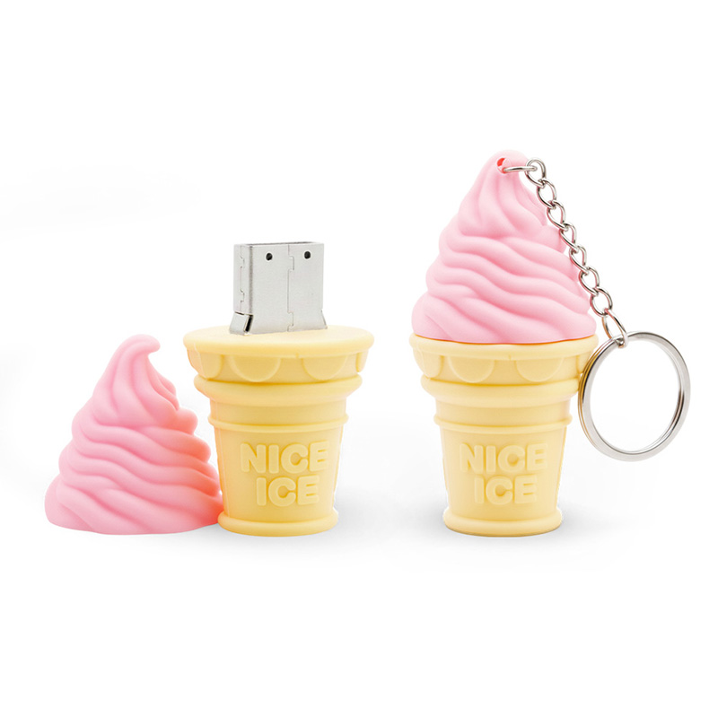 A 3D USB pendrive shaped like an ice cream cone with a yellow cone and a pink cap resembling a soft ice cream scoop. One pendrive is open with the USB connector visible, while the other is closed and equipped with a metal keyring. The Decard logo is visible in the bottom right corner.