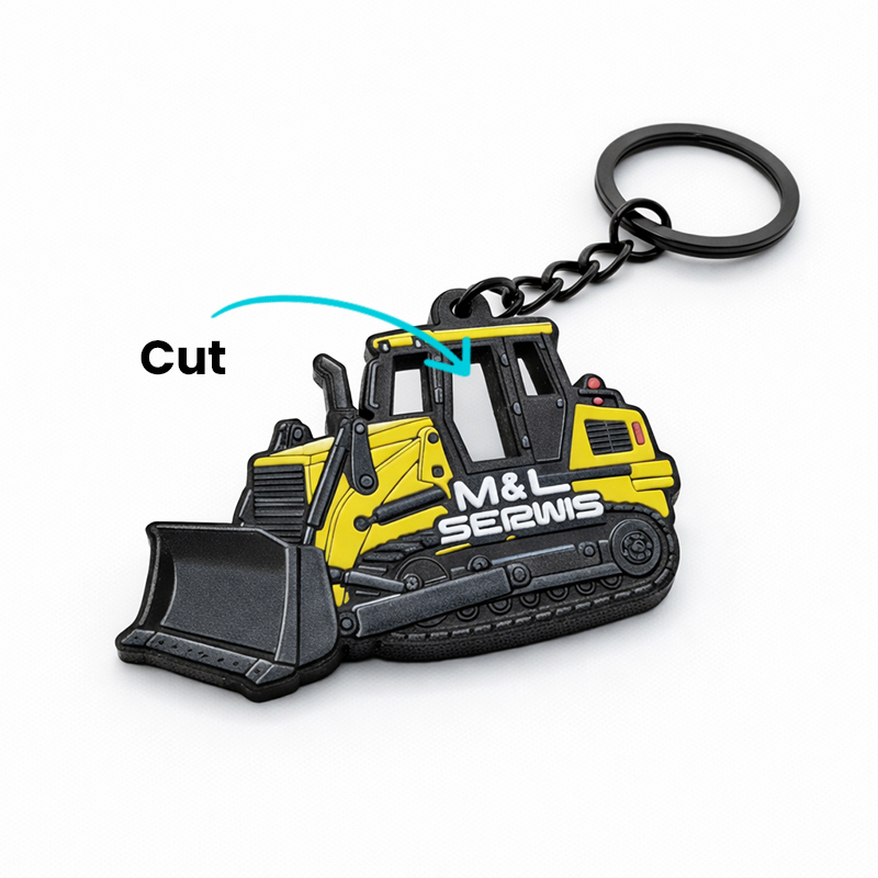 Metal keychain with a cutout, crawler bulldozer shape, with a logo, made by the Polish manufacturer DECARD