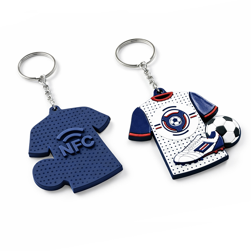 A 3D keychain in the shape of a sports jersey, featuring a raised football and soccer boot, in vivid colors, with an NFC tag on the back, manufactured by the Polish producer DECARD