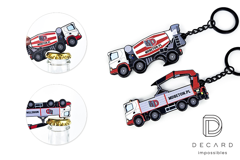 Metal bottle opener keychain with a crane and concrete mixer design, made by the Polish manufacturer