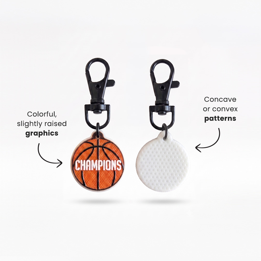 Basketball keychain with a carabiner, featuring a slightly raised full-colour design on the front and raised or recessed patterns on the back